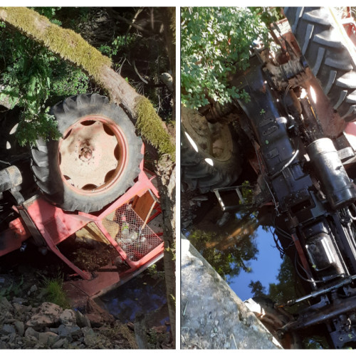 Cluj- Accident grav: Un tractor s-a răsturnat de pe un pod și a căzut în albia râului. Șoferul rănit, blocat în cabină, a fost scos de localnici FOTO