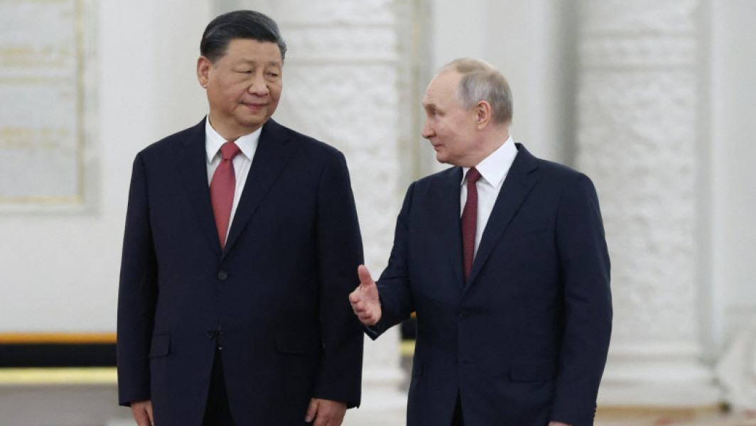 Analiză Putin merge în China, într-o vizită „fără precedent”. Ce va încerca liderul rus să obțină de la Xi Jinping, în contextul războiului