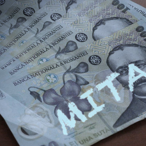 Ofițer de poliție din Giurgiu reținut pentru luare de mită în dosar de evaziune fiscală