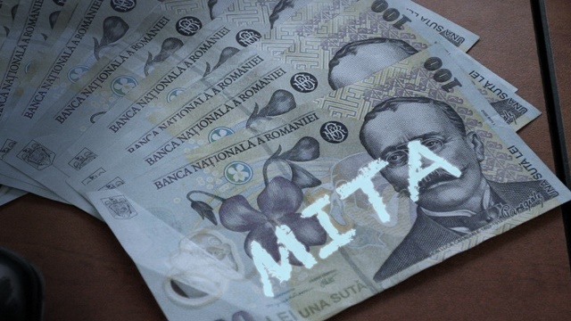 Comisar șef din Giurgiu reținut în flagrant pentru luare de mită de 10.000 de lei